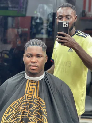 Logo de Emeka barber shop
